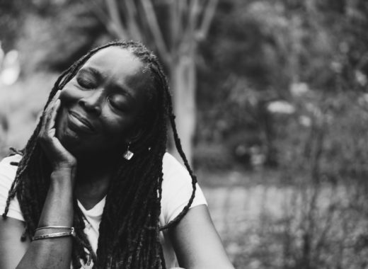 Lady with locs black and white